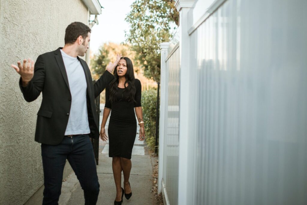 Couple in a tense conversation outdoors